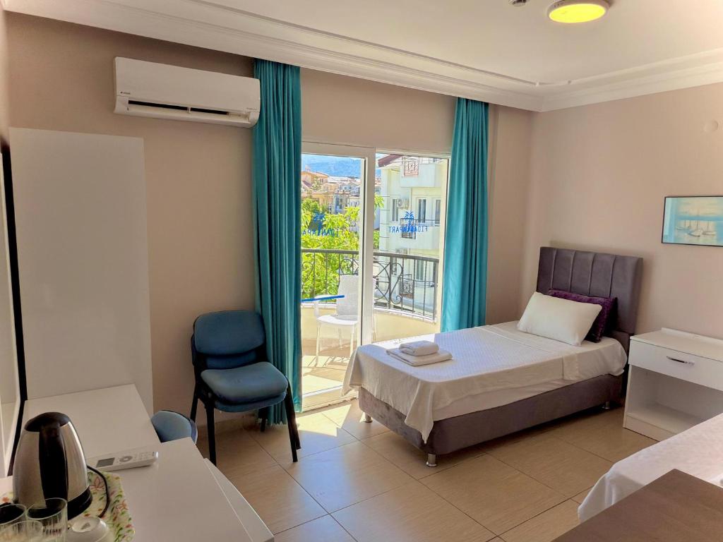 Postel nebo postele na pokoji v ubytování Fidan Apart Hotel