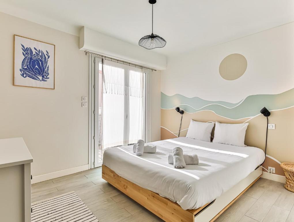 Posteľ alebo postele v izbe v ubytovaní Appartement cocooning proche centre ville et gare