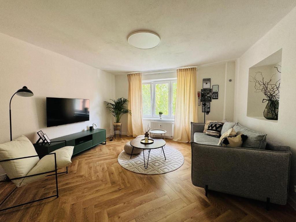 Televízia a/alebo spoločenská miestnosť v ubytovaní Apartment YuPa