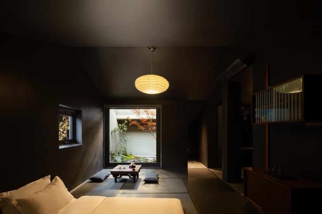 Postel nebo postele na pokoji v ubytování Hangzhou KeYe Homestay