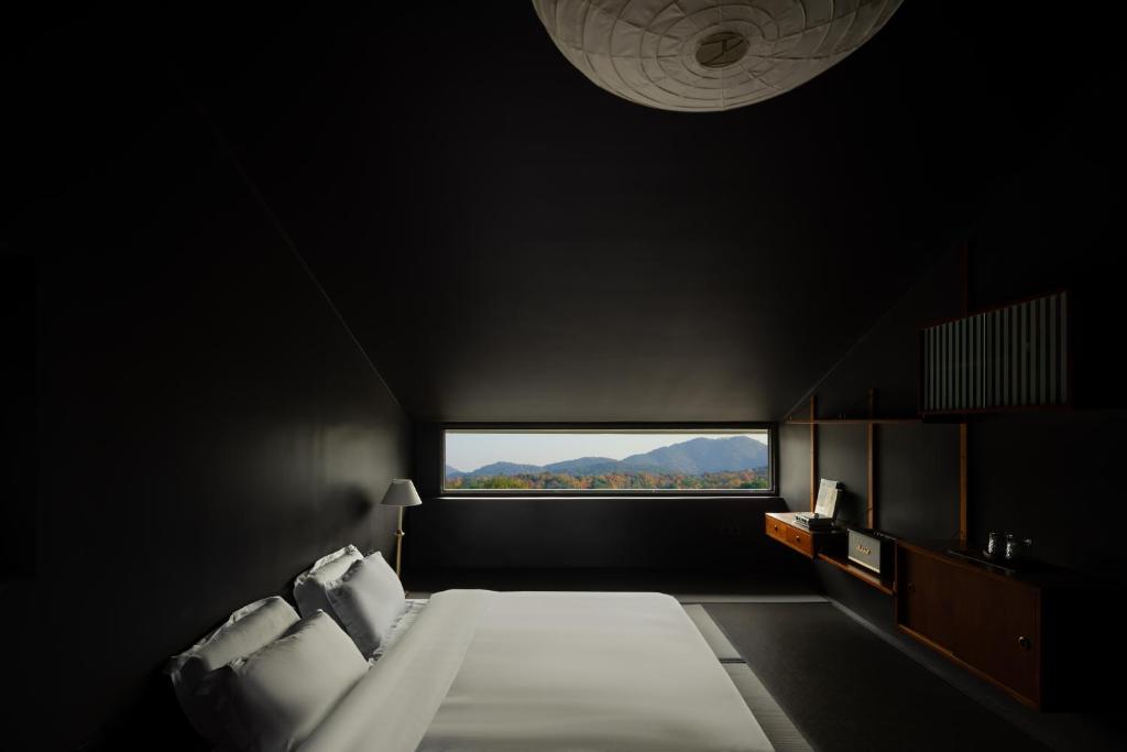Postel nebo postele na pokoji v ubytování Hangzhou KeYe Homestay