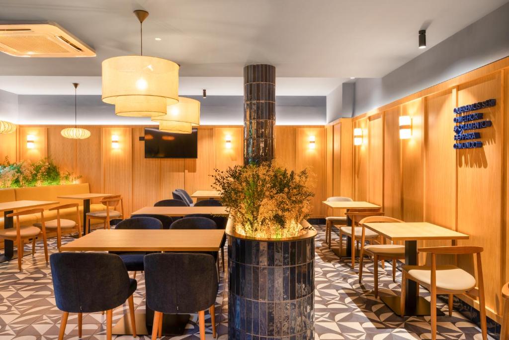 TV a/nebo společenská místnost v ubytování B&B HOTEL Braga Lamacaes