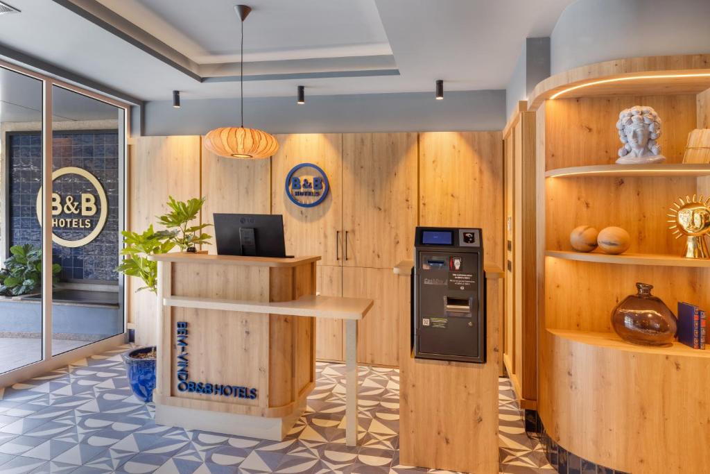 Kuchyň nebo kuchyňský kout v ubytování B&B HOTEL Braga Lamacaes