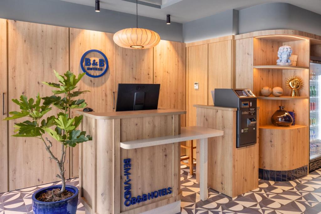 Kuchyň nebo kuchyňský kout v ubytování B&B HOTEL Braga Lamacaes