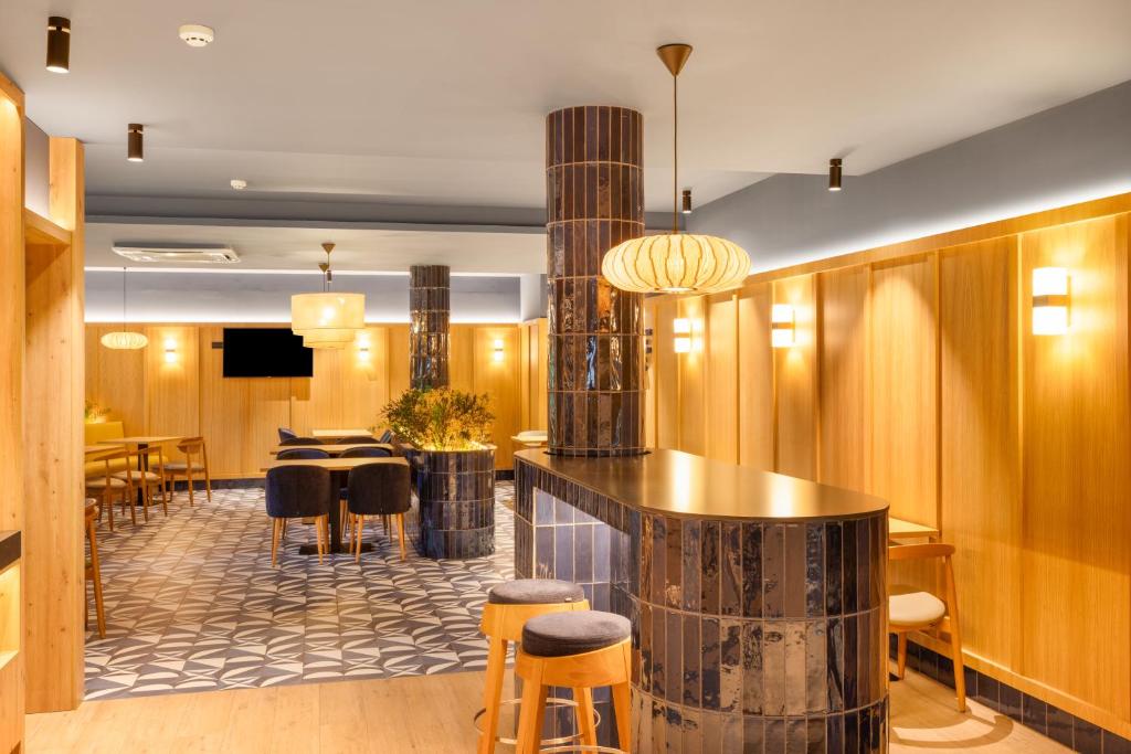 TV a/nebo společenská místnost v ubytování B&B HOTEL Braga Lamacaes