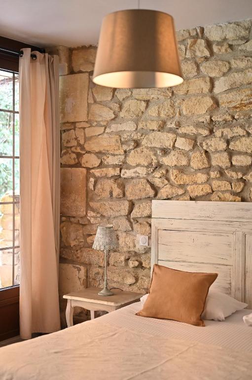 Postel nebo postele na pokoji v ubytování Mas des Comtes de Provence