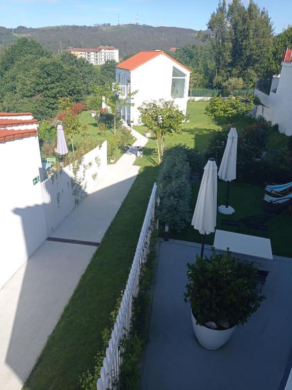 LAR JARDÍN - Casas con parking privado - 18