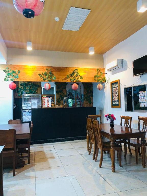 TV a/nebo společenská místnost v ubytování Axis Pension Hotel