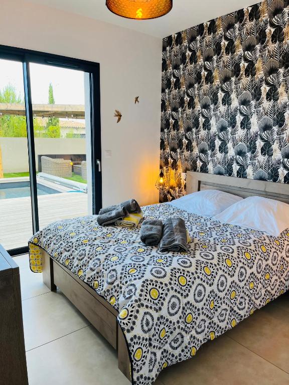 Posteľ alebo postele v izbe v ubytovaní VILLA LE CORAIL ROUGE CORSE