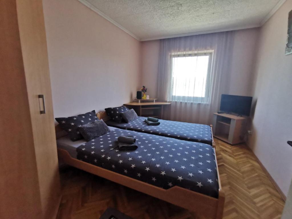 Krevet ili kreveti u jedinici u objektu Dunav 009