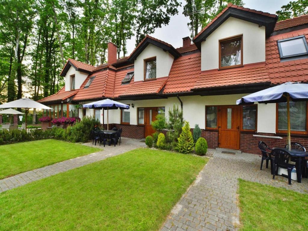 Vonkajšia záhrada v ubytovaní 2-room apartment 30 m2, Rewal