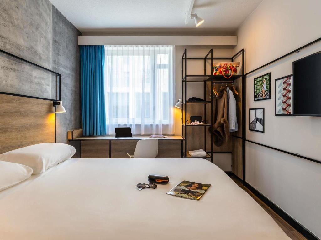 Postel nebo postele na pokoji v ubytování Ibis Namur Centre
