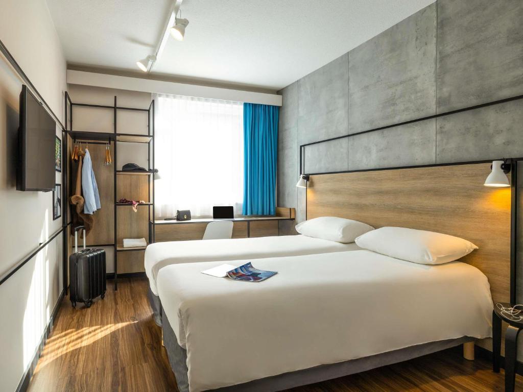 Postel nebo postele na pokoji v ubytování Ibis Namur Centre