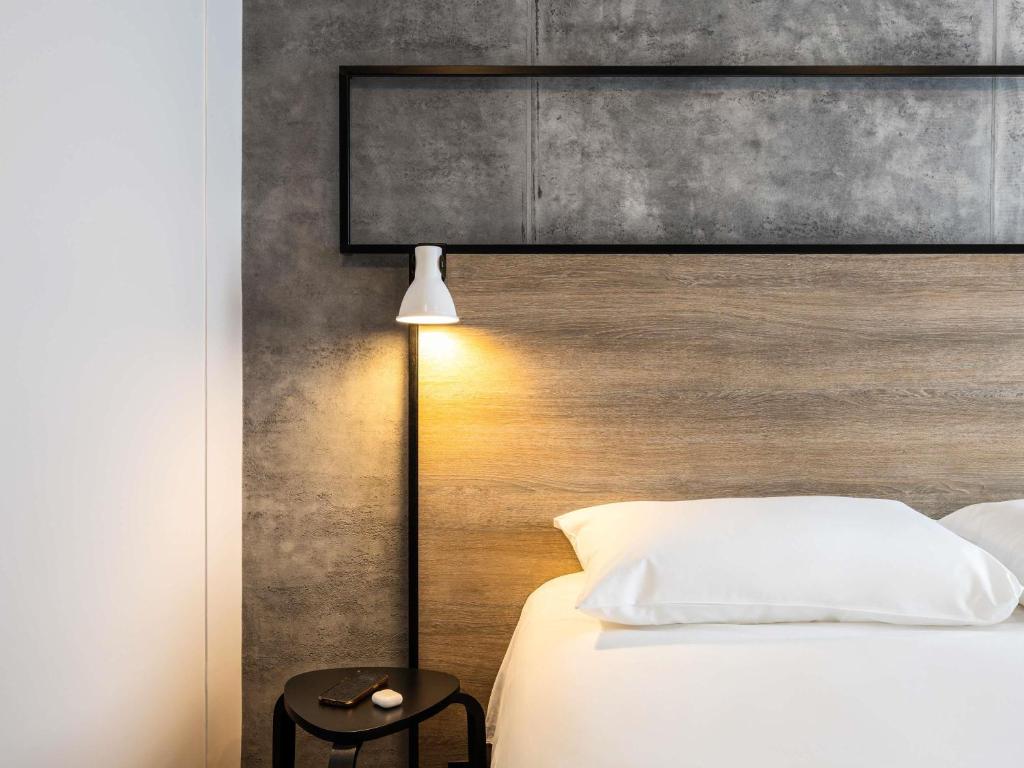 Postel nebo postele na pokoji v ubytování Ibis Namur Centre