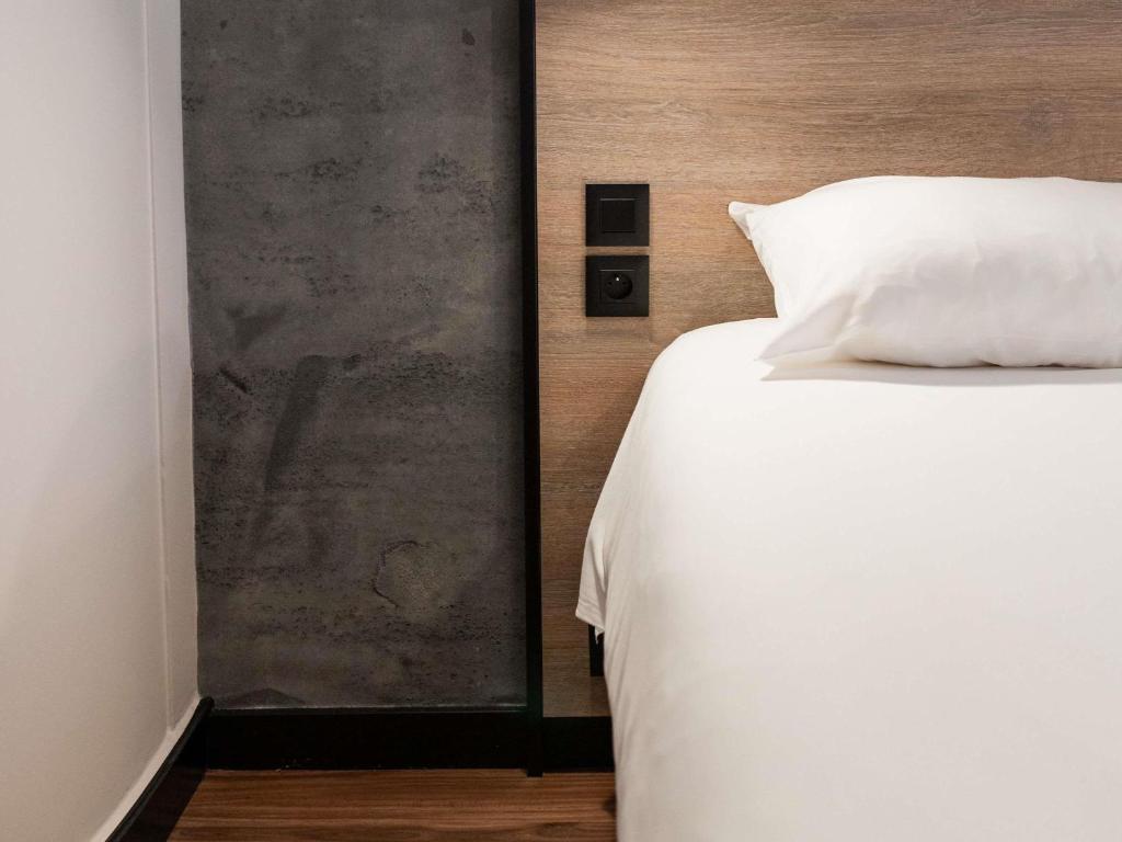 Postel nebo postele na pokoji v ubytování Ibis Namur Centre
