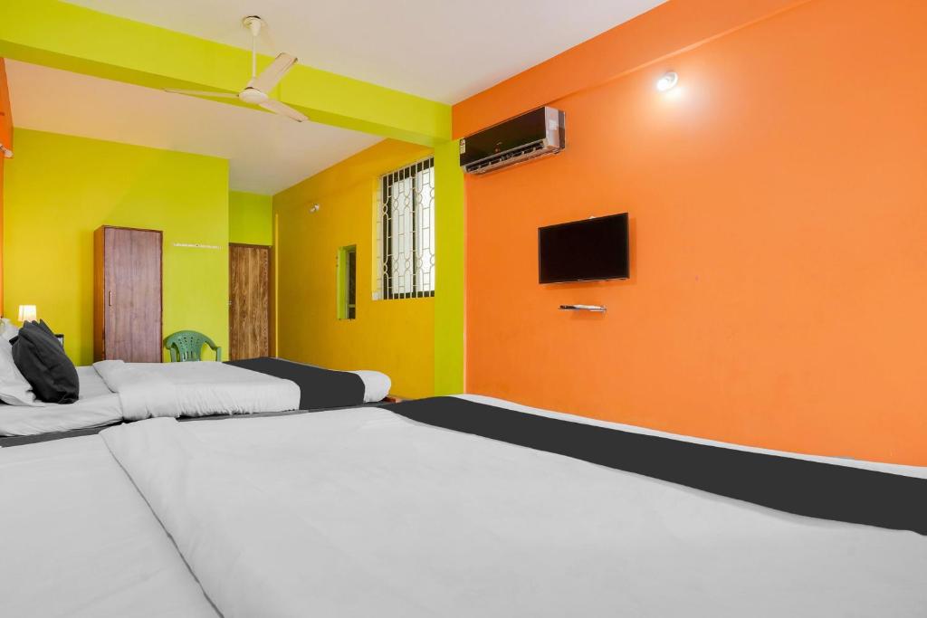 TV a/nebo společenská místnost v ubytování Hotel O Sai Deep Place