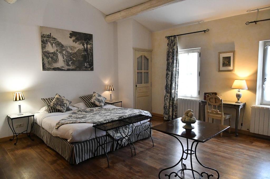 Postel nebo postele na pokoji v ubytování Mas des Comtes de Provence