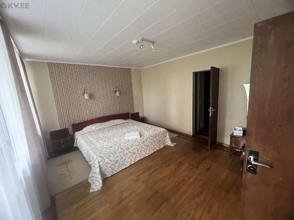 Postel nebo postele na pokoji v ubytování Narva-Jõesuu Beach Residence