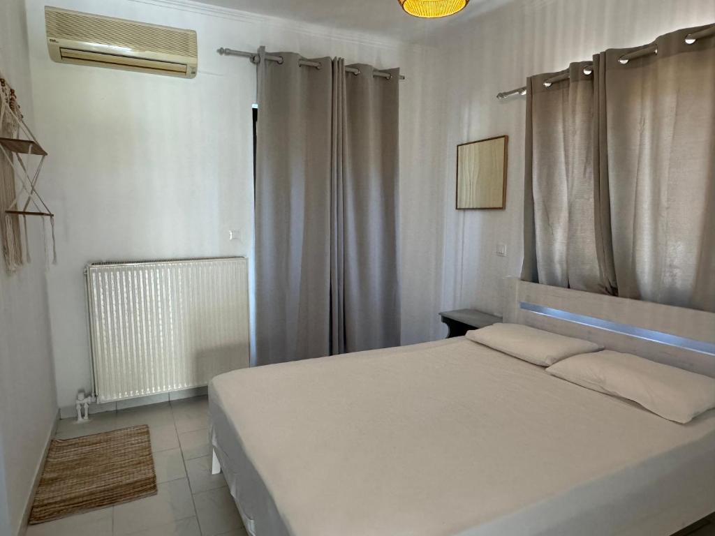 Postel nebo postele na pokoji v ubytování Koala Place