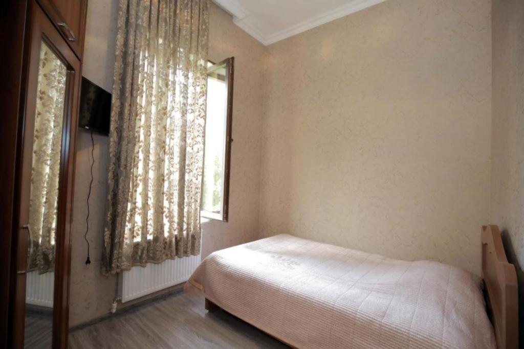 Postel nebo postele na pokoji v ubytování Medea Guest House