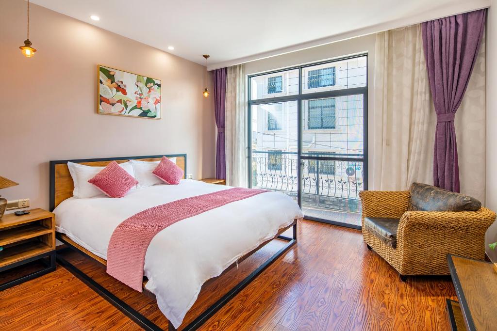 Postel nebo postele na pokoji v ubytování Shanghai nanfeng hotel-上海楠枫花园酒店
