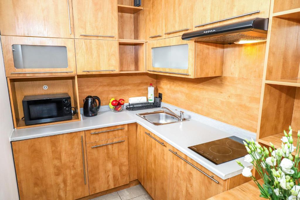 Kuchyňa alebo kuchynka v ubytovaní Warsaw Apartments - Apartamenty Sadyba