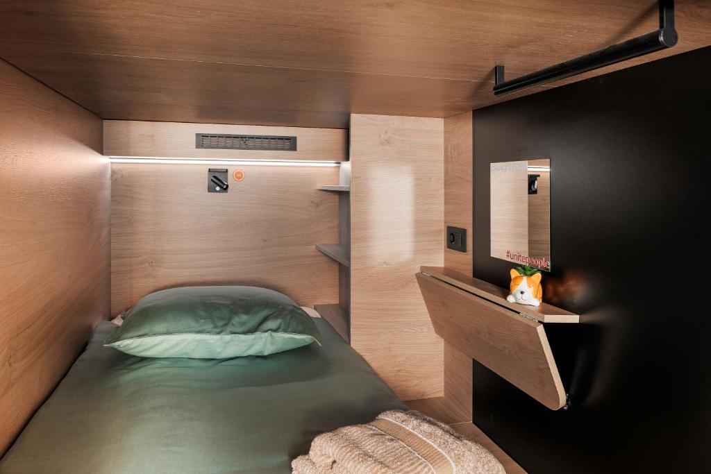 Postel nebo postele na pokoji v ubytování U-NIGHT Hostel
