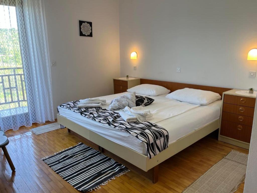 Postel nebo postele na pokoji v ubytování B&B Kovač