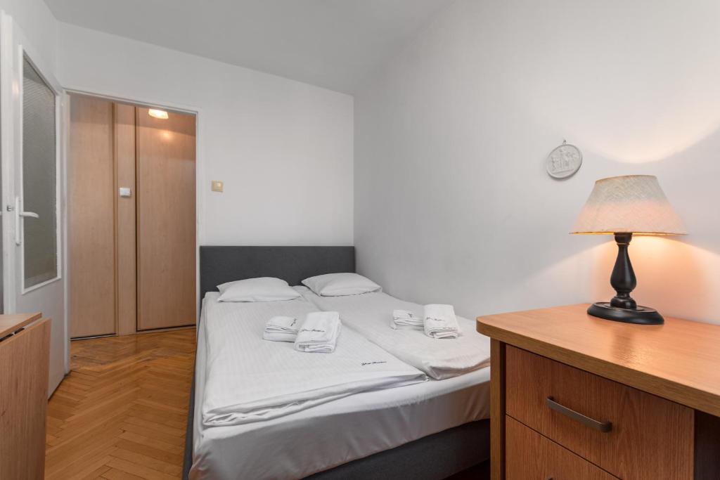 Posteľ alebo postele v izbe v ubytovaní Apartament Emilii Plater by Your Freedom
