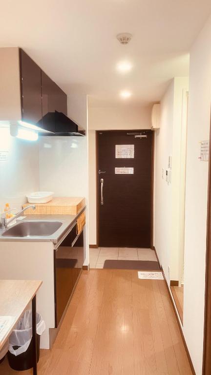 Kuchyň nebo kuchyňský kout v ubytování SkyHotel Ryogoku 駅徒歩4分
