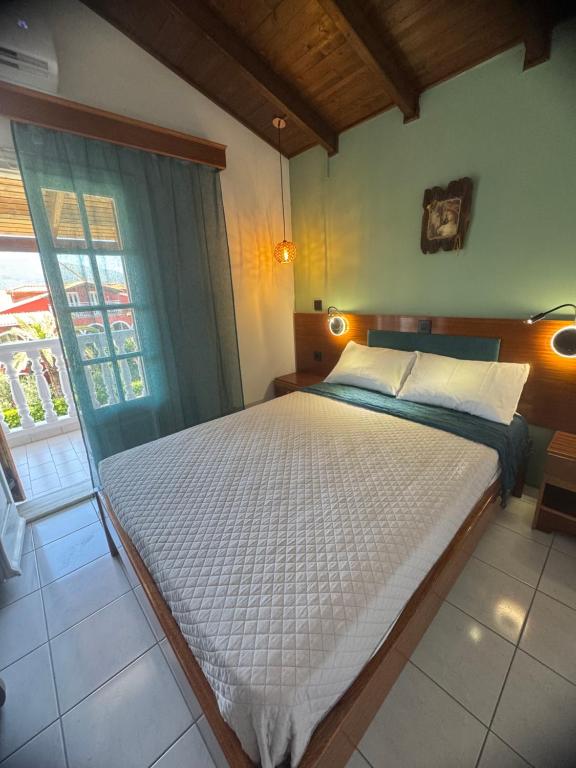 Letto o letti in una camera di Dionysos Studios