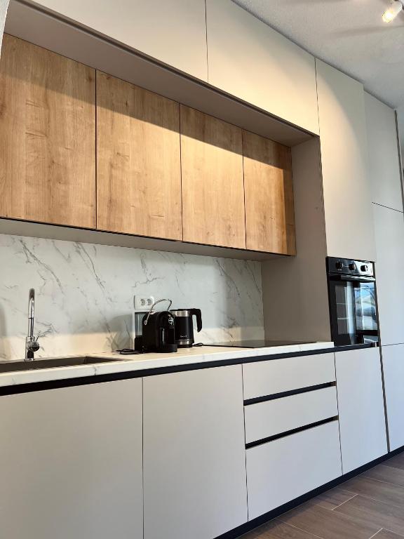 مطبخ أو مطبخ صغير في Apartments Mrdak