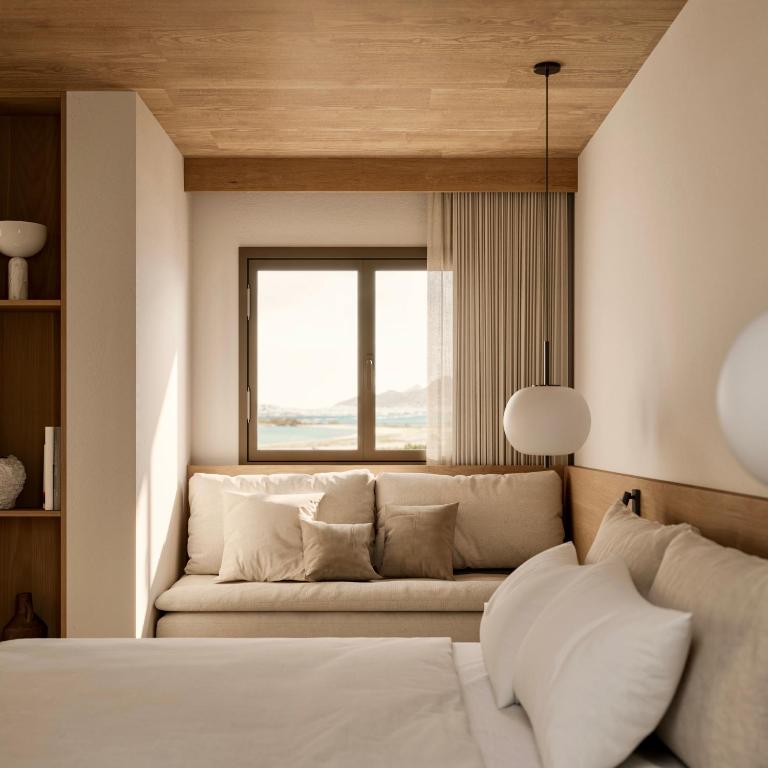 Postel nebo postele na pokoji v ubytování Laguna Coast Resort, Small Luxury Hotels of the World