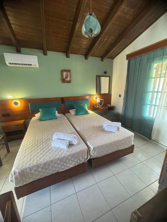 Letto o letti in una camera di Dionysos Studios