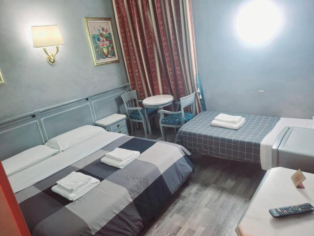 Letto o letti in una camera di Hotel Positano 2