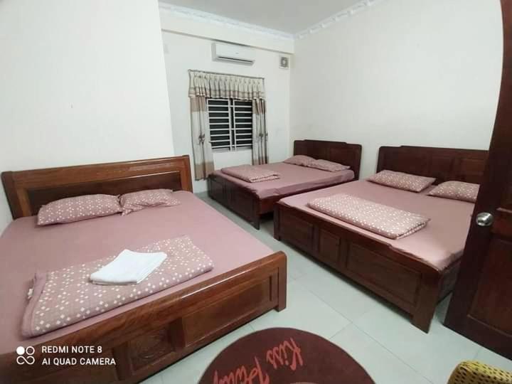 Postel nebo postele na pokoji v ubytování Motel Thanh Huyền - Bãi sau