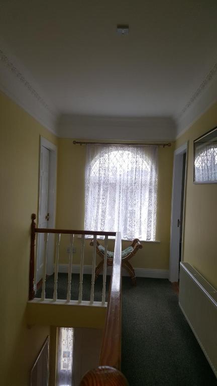 Postel nebo postele na pokoji v ubytování The Yellow House B&B Navan