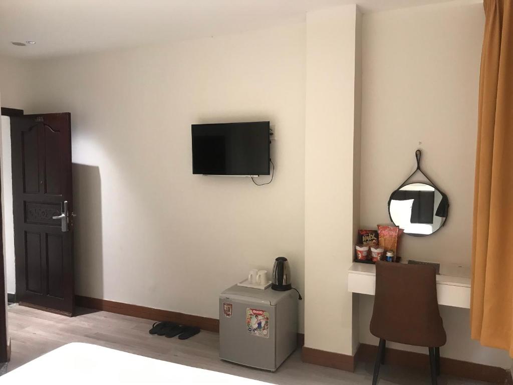 TV a/nebo společenská místnost v ubytování Lookits Hostel