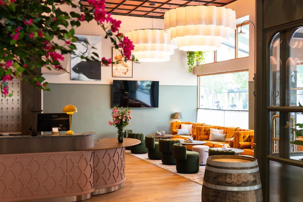 TV a/nebo společenská místnost v ubytování Hotel Fratelli