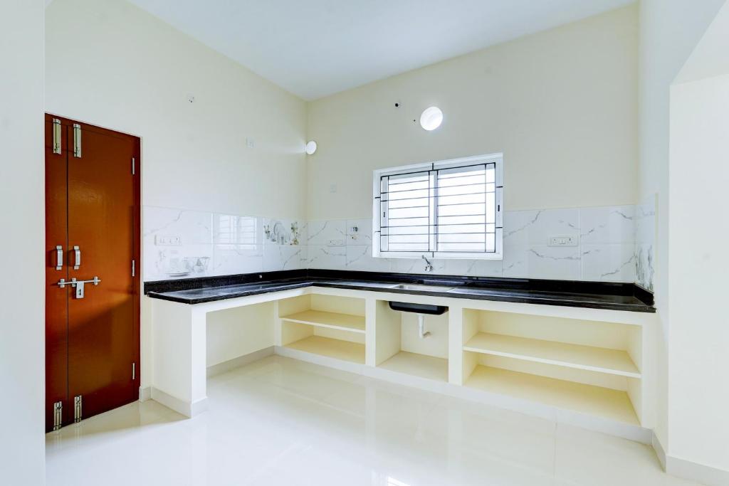 Fotografie z fotogalerie ubytování Hotel O Elegant Residency Vandalur Zoo v destinaci Čennaí
