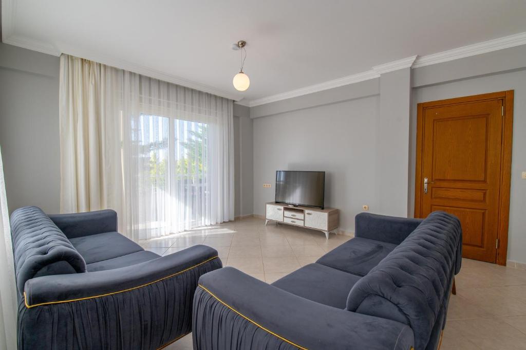 A television and/or entertainment centre at Hanel Life Royal Villas 7 Aqualettings