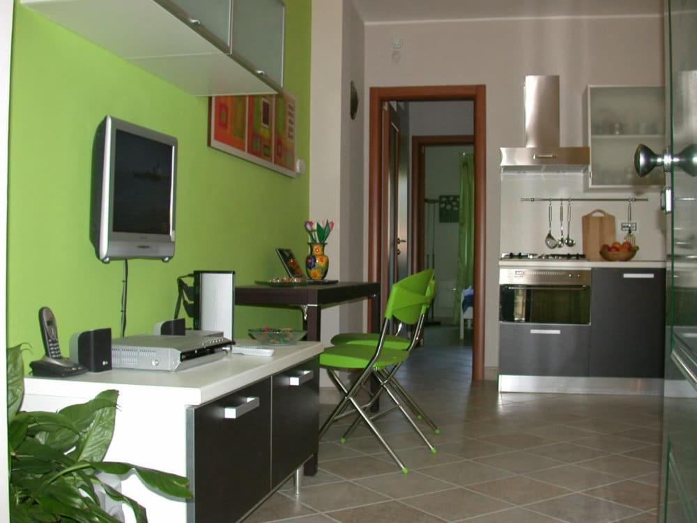 Kuchyň nebo kuchyňský kout v ubytování Rosta Residence Ranverso