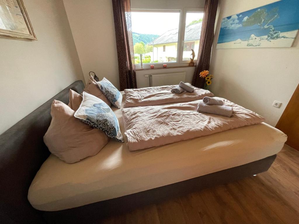 Postel nebo postele na pokoji v ubytování Seewohnung Weiss