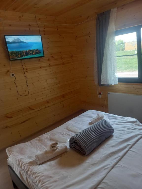 Postel nebo postele na pokoji v ubytování Пляжный дом