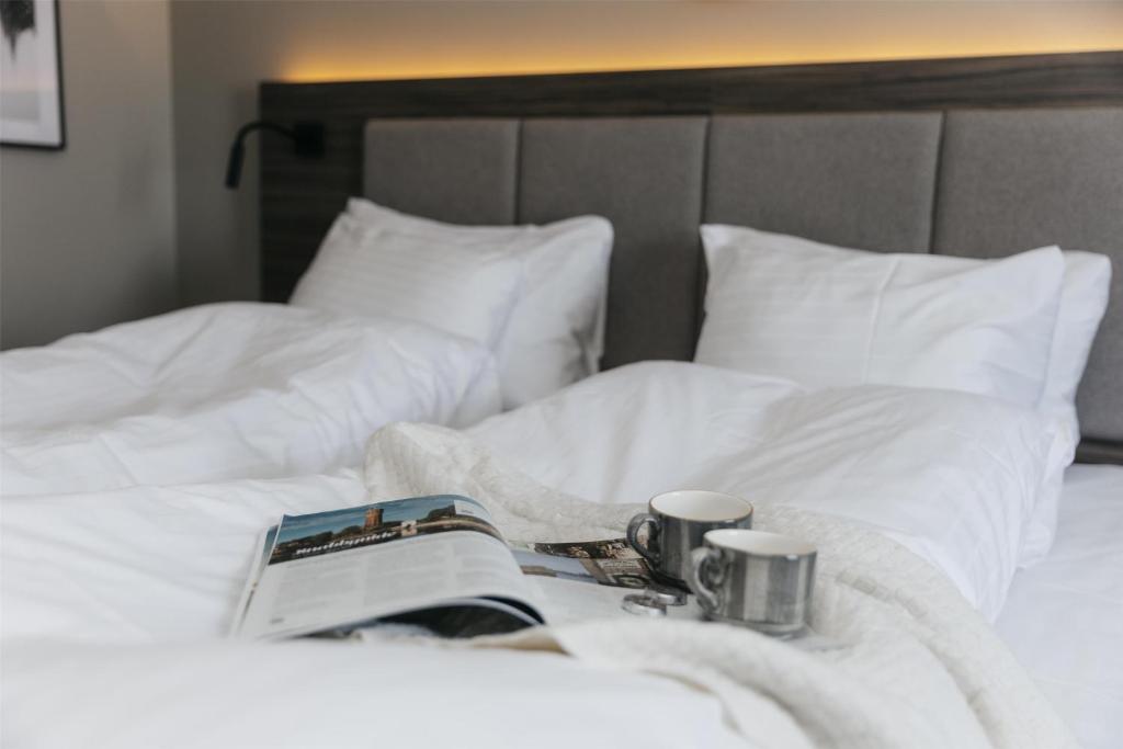 Postel nebo postele na pokoji v ubytování Best Western Plus Kalmarsund Hotell