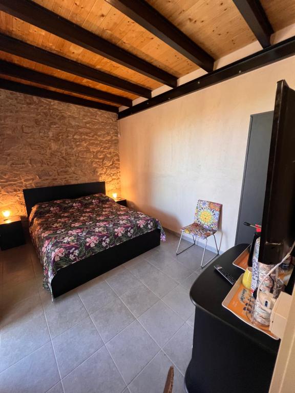 Vigna di pettineo - guest house客房内的一张或多张床位