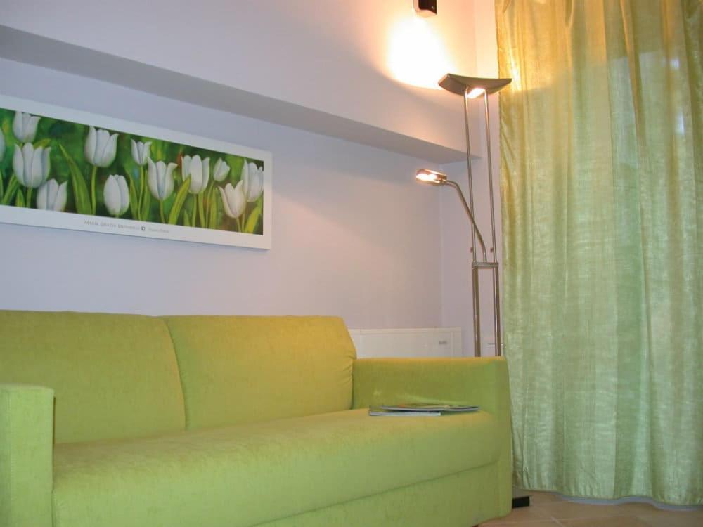 Posezení v ubytování Rosta Residence Ranverso