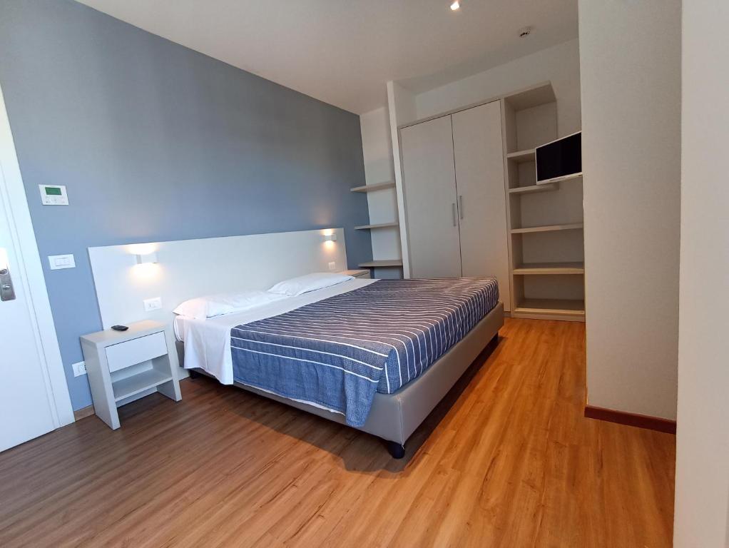 Postel nebo postele na pokoji v ubytování Hotel Atlas
