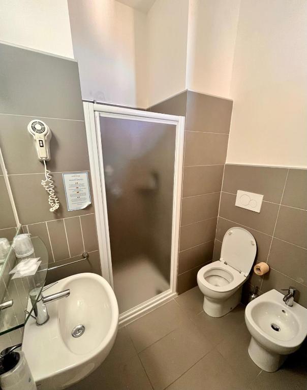 Koupelna v ubytování Hotel Atlas