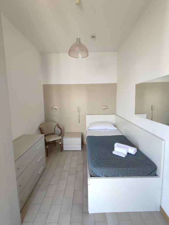 Postel nebo postele na pokoji v ubytování Hotel Atlas